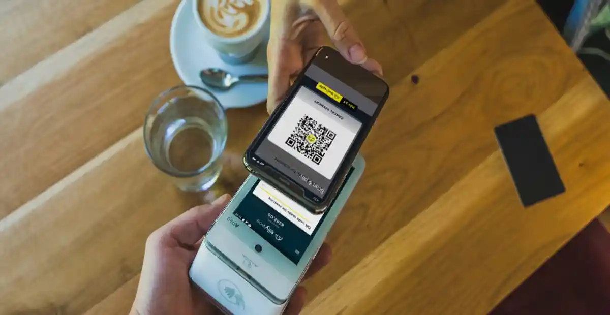 How a QR Code Ordering System Reduces Staff Workload in Hotels 2 Contactless QR code payment and digital ordering system in modern cafe setup